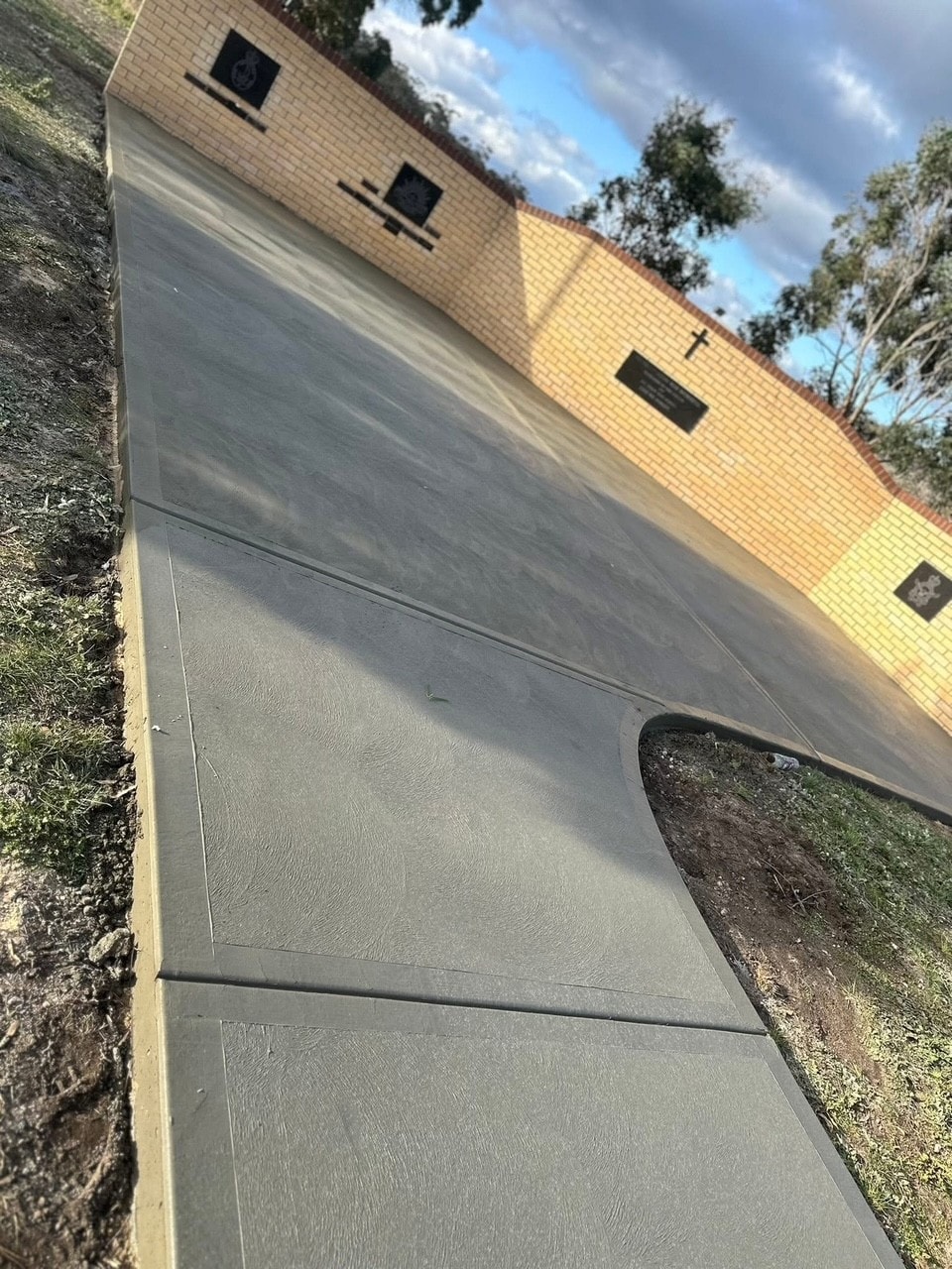 Concrete path and apron, community project