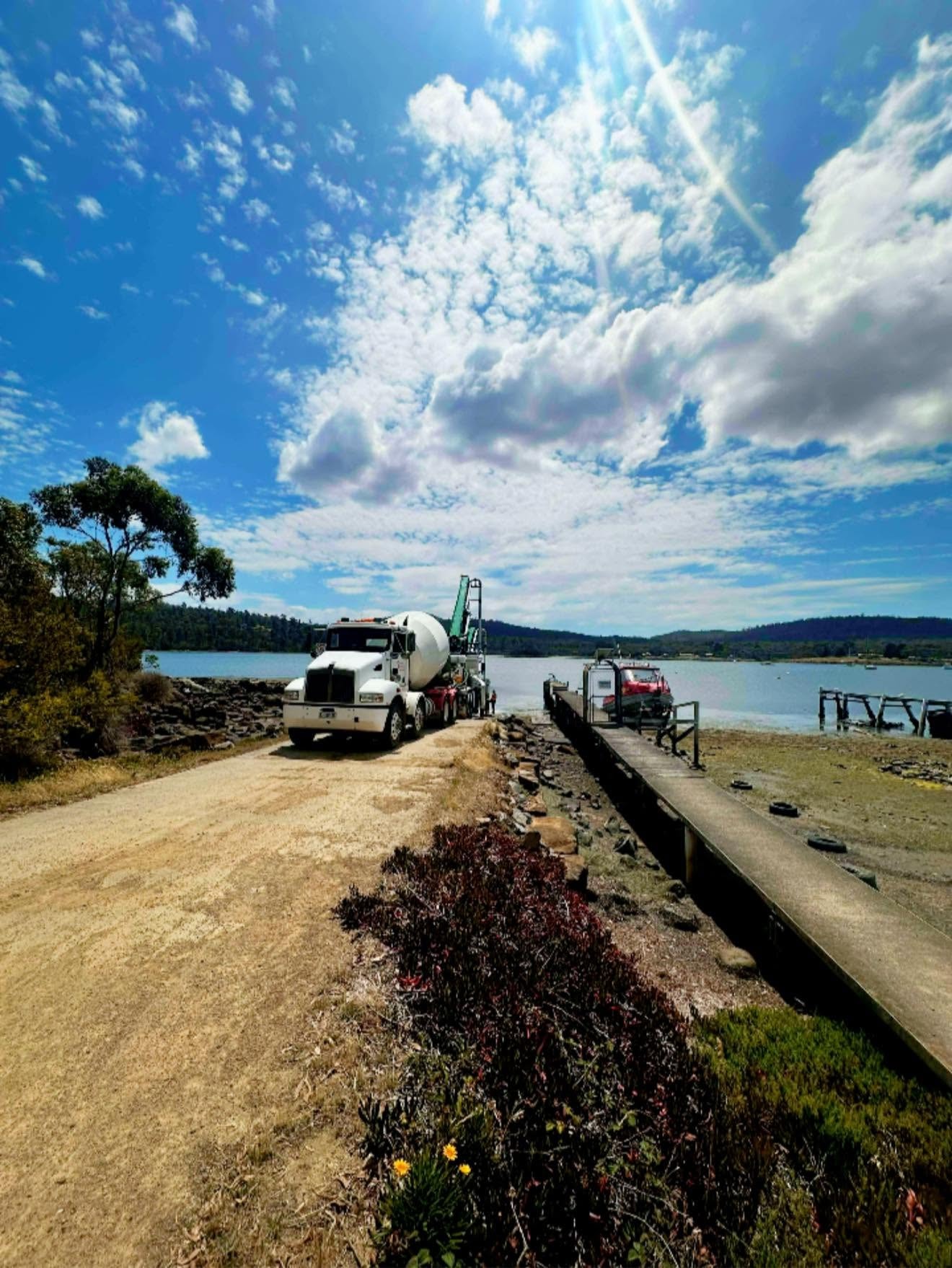 Mixer truck at the boat ramp, waterside delivery